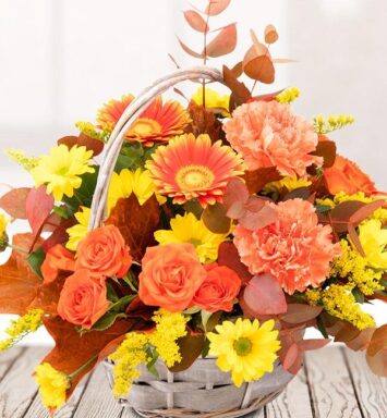 a basket of flowers on a table