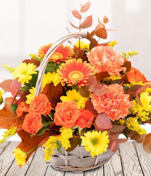 a basket of flowers on a table