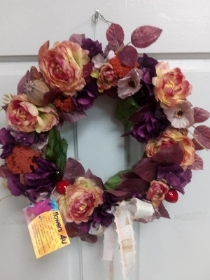 a wreath with flowers on it